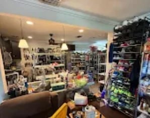 Interior of a retail store with shelves displaying merchandise after hoarder house cleanout